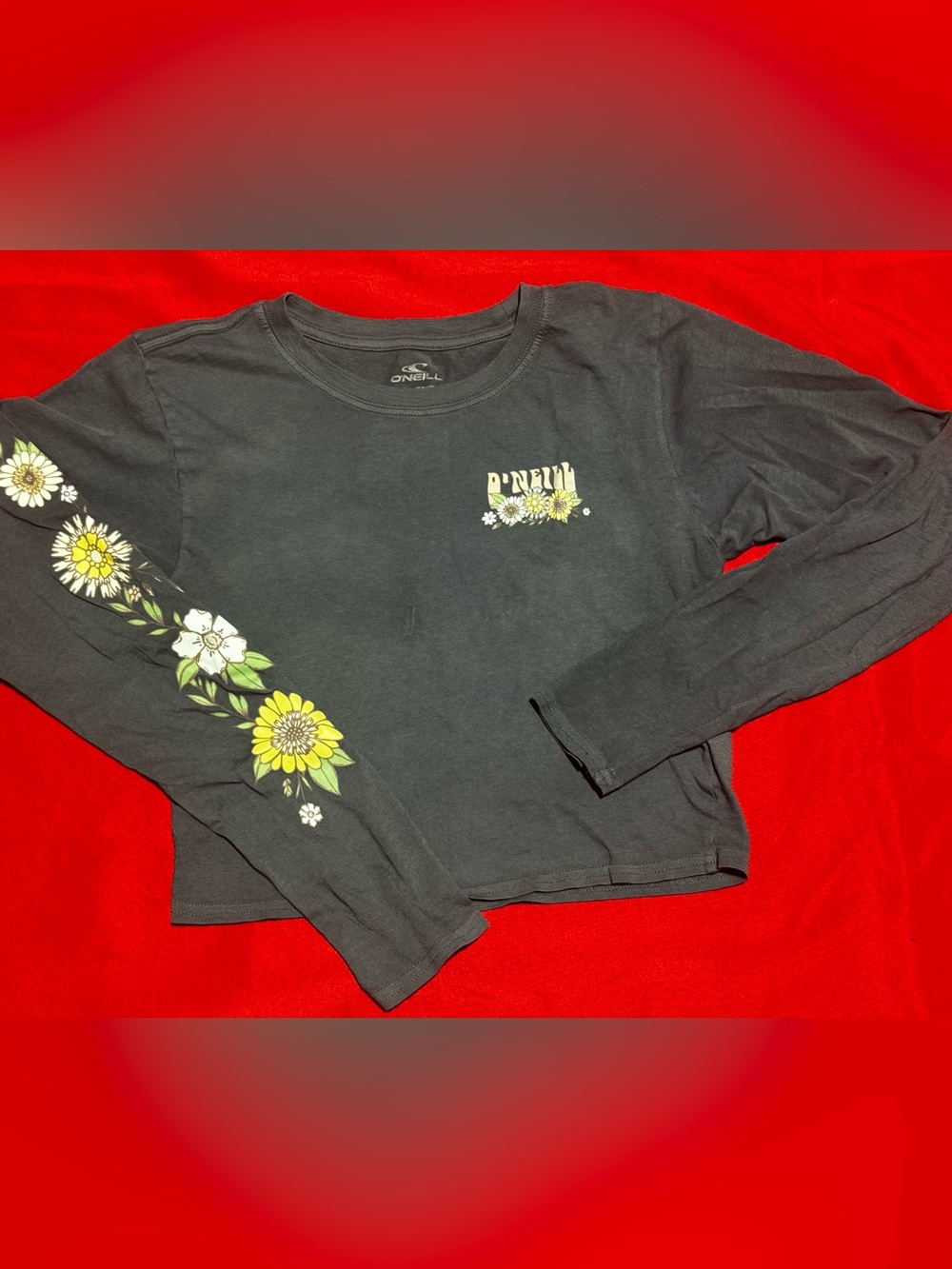 O'Neill Black Long-Sleeve Crop Top with Yellow & Green Floral Sleeve